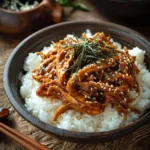 Delicious Crock Pot Teriyaki Chicken served with rice and vegetables