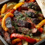 Grilled steak fajitas served with peppers and onions on a plate