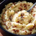 Delicious slow cooker mashed potatoes served in a bowl, perfect for any meal.