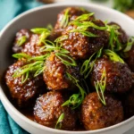 Delicious crockpot honey garlic meatballs served on a platter.