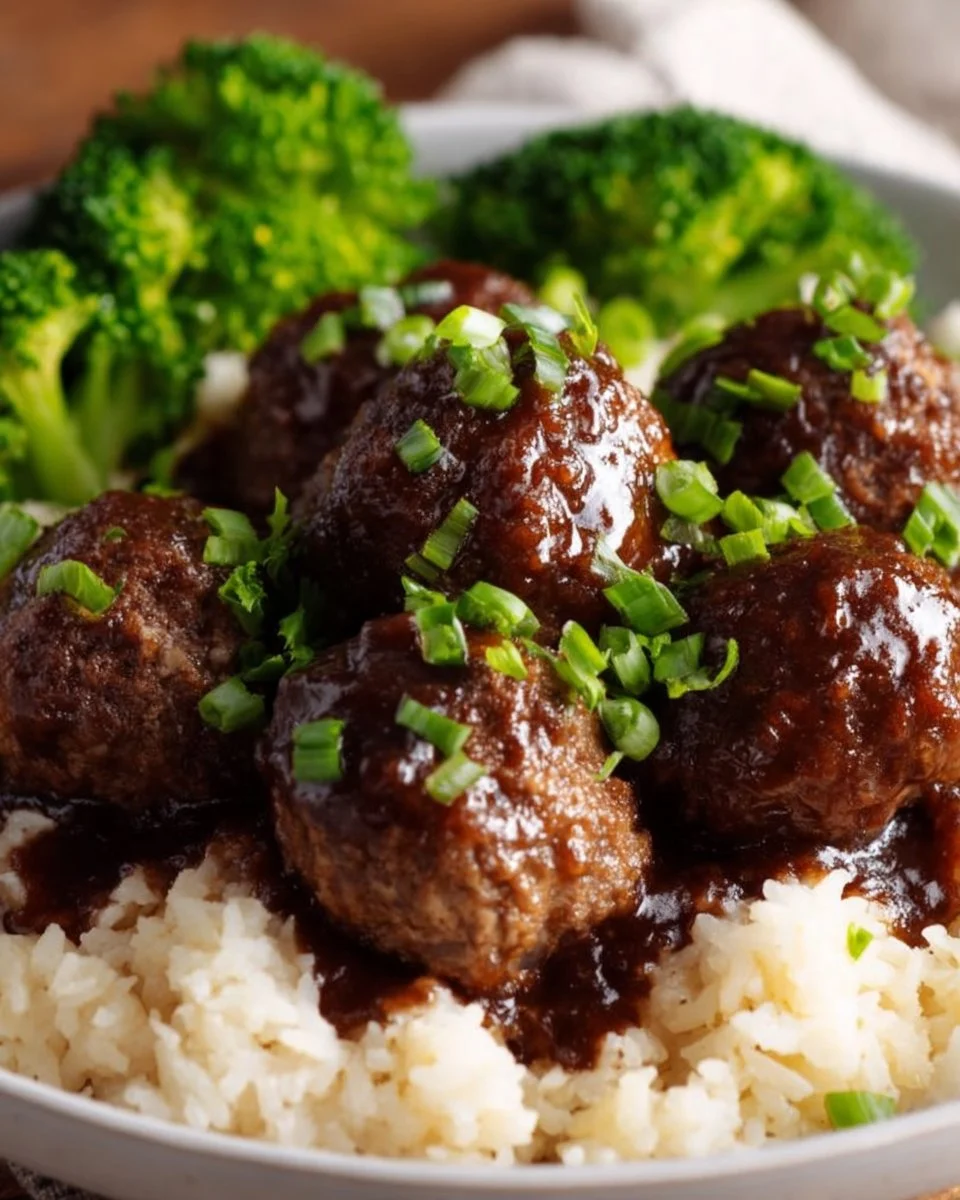 Delicious plate of easy teriyaki meatballs topped with sesame seeds