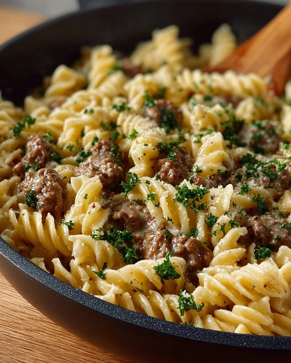 Delicious ground beef stroganoff served on a plate with noodles and mushrooms