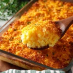 Delicious cheesy potato casserole topped with melted cheese and baked to perfection