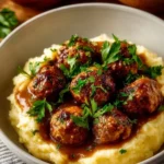 Delicious homemade brown gravy served over mashed potatoes