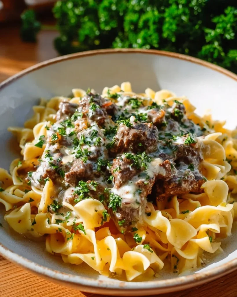 A delicious bowl of easy ground beef stroganoff served with pasta.
