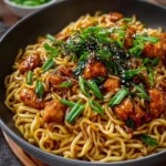 Delicious Garlic Chicken Noodles served in a bowl with vegetables