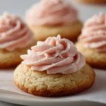 Delicious sugar cookie buttercream frosting spread on a cookie