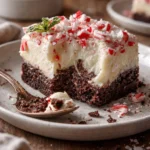 Delicious Candy Cane Lush dessert served on a festive plate.
