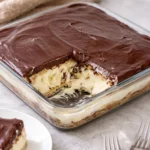 No bake chocolate eclair cake with layers of cream and chocolate frosting
