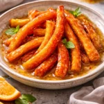 Sweet candied orange peels made with honey, a delicious homemade treat.