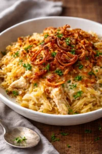 Creamy French Onion Chicken Orzo Casserole baked in a ceramic dish