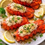 Deliciously prepared Garlic Butter Lobster Tails served on a plate