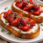 Roasted strawberry and whipped ricotta spread on toasted bread