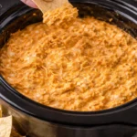 Delicious Crockpot Buffalo Chicken Dip served in a bowl with tortilla chips