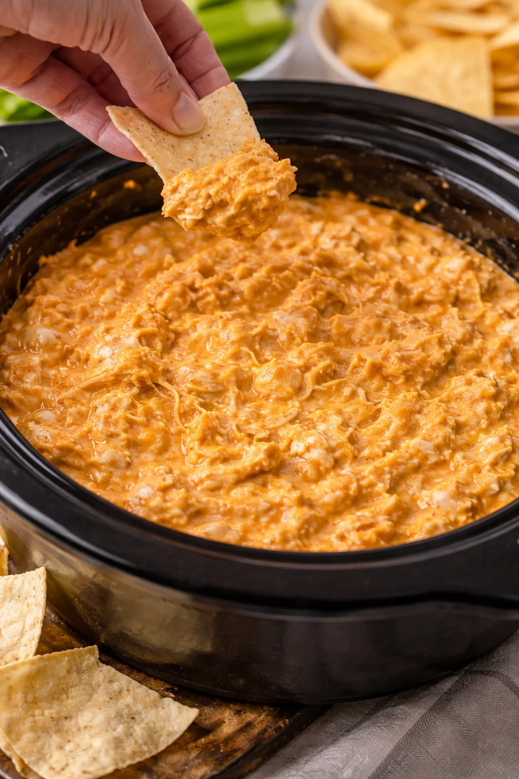 Delicious Crockpot Buffalo Chicken Dip served in a bowl with tortilla chips