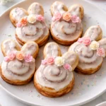 Easter Bunny cinnamon rolls decorated with icing and edible eyes