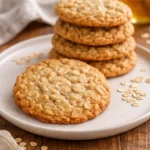 Freshly baked honey oatmeal cookies on a cooling rack