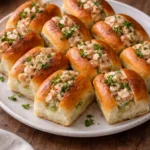 Tasty mini shrimp rolls served on a plate