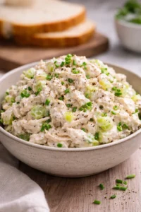 Delicious simple chicken salad served in a bowl with fresh ingredients
