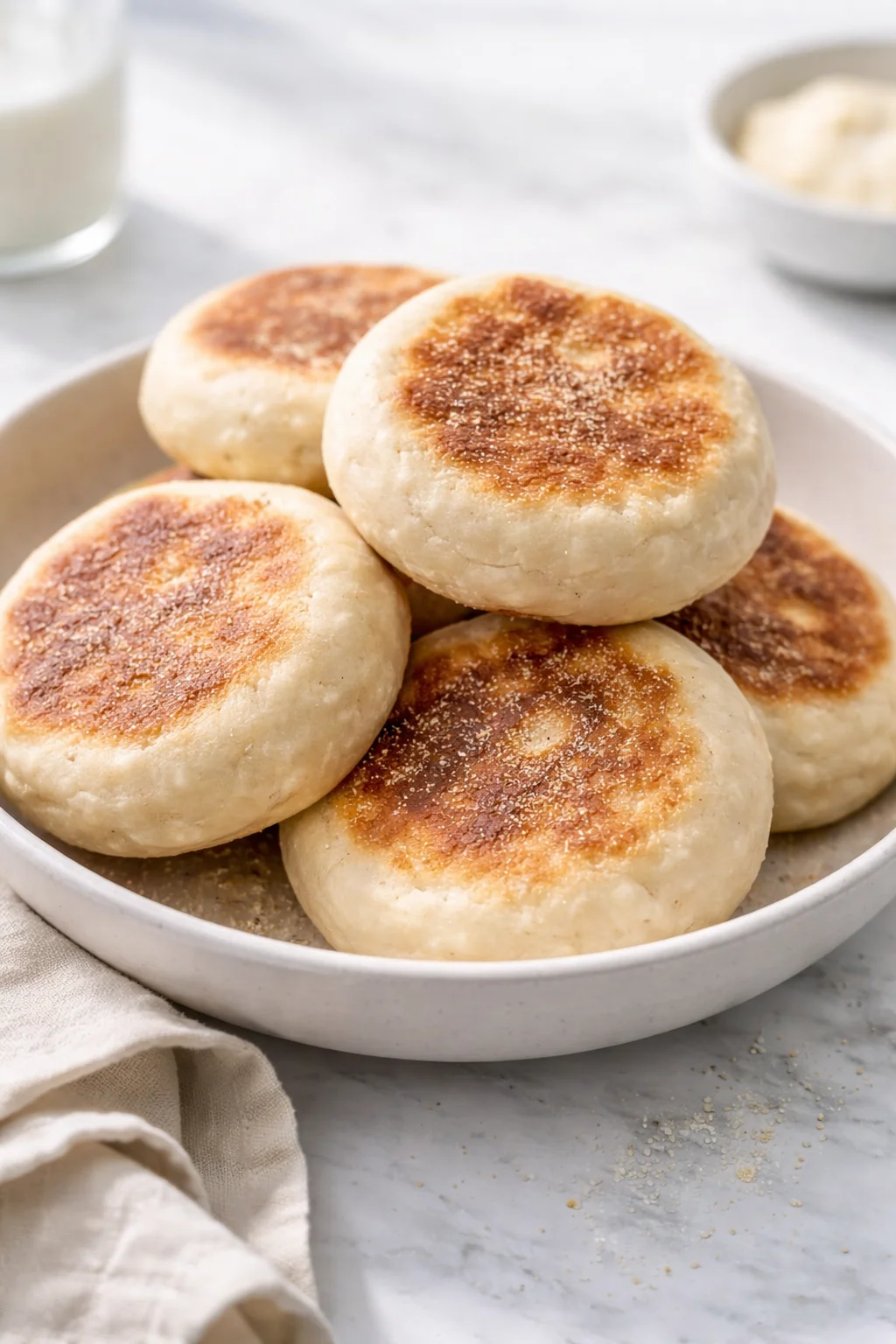 Delicious homemade sourdough English muffins fresh out of the oven