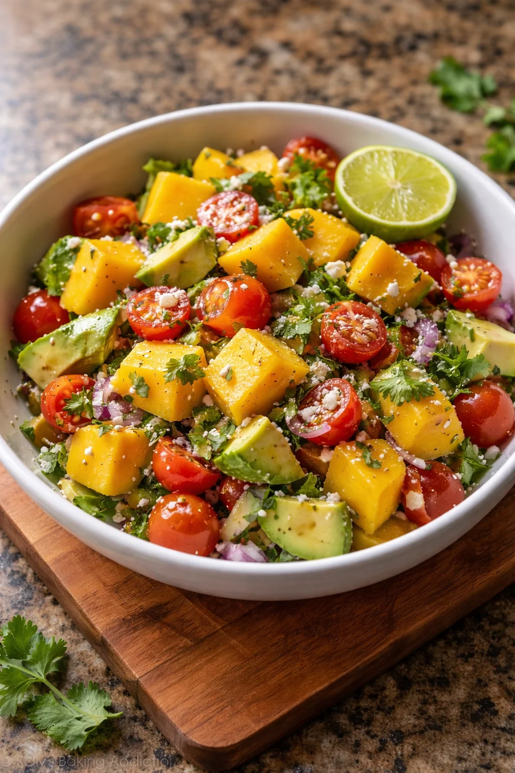 Avocado Mango Salad with zesty lime dressing in a bowl