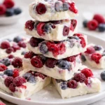 Easy yogurt bark topped with fruits and nuts, a healthy snack option.