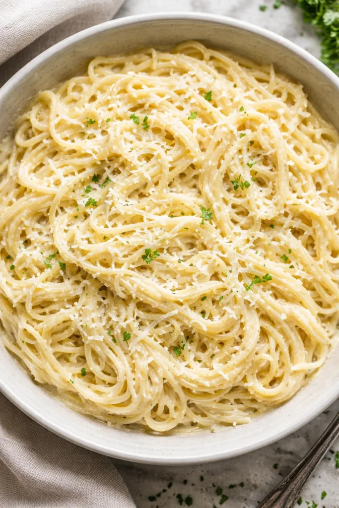 Creamy Parmesan Garlic Angel Hair Pasta served in a bowl