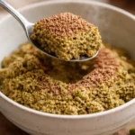 Crunchy Dubai chocolate bar with pistachio filling showcasing texture and confectionery appeal.