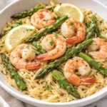 Plate of Lemon Garlic Shrimp with Asparagus and Orzo