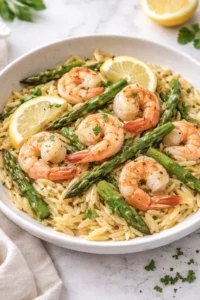 Plate of Lemon Garlic Shrimp with Asparagus and Orzo