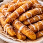 Crispy air fryer apple fries served on a plate