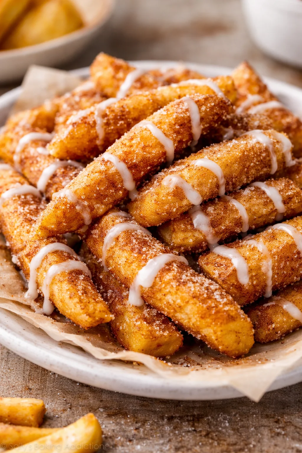 Crispy air fryer apple fries served on a plate