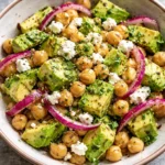 Chickpea Feta Avocado Salad with vibrant vegetables in a bowl